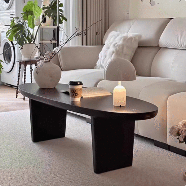 Screenshot 2025-08-04 at 01.48.55 Mid Century Black Oval Solid Wood Coffee Table