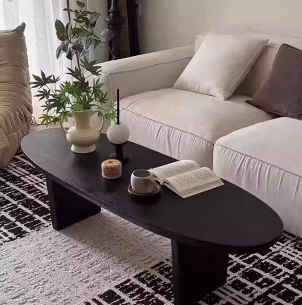 Screenshot 2025-08-04 at 01.49.02 Mid Century Black Oval Solid Wood Coffee Table